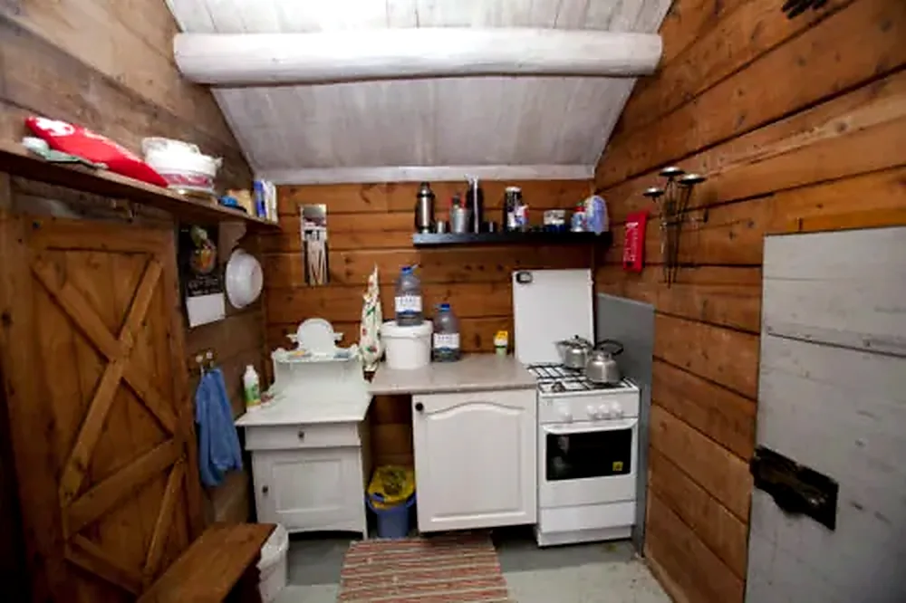 Propane stove and simple kitchen facilities inside the Red Cabin